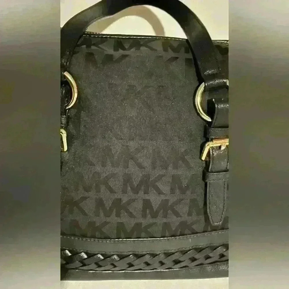 A Mickael Kors black Gladstone satchel with gold tone hardware. - Picture 2 of 14